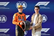 Aarif Lee presents the Pirelli Pole Position Award to Oscar Piastri of Australia and the McLaren F1 Team - Source: Getty